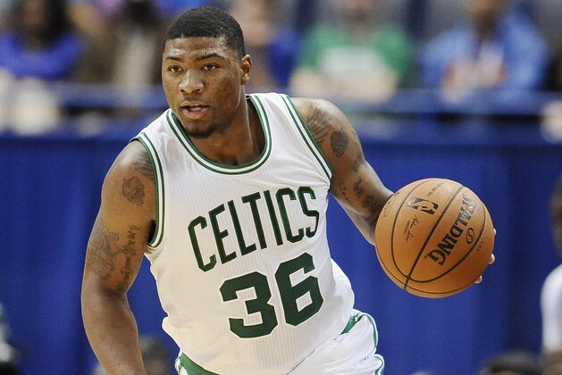 Boston Celtics guard Marcus Smart (36) during the first during the second quarter of a preseason NBA basketball game, Wednesday, Oct. 8, 2014, in Hartford, Conn. (AP Photo/Jessica Hill)