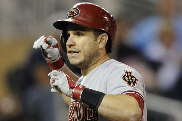 MINNEAPOLIS, MN - SEPTEMBER 22: Miguel Montero #26 of the Arizona Diamondbacks reacts after losing his bat in the stands on a swing during the seventh inning of the game against the Minnesota Twins on September 22, 2014 at Target Field in Minneapolis, Minnesota. The Diamondbacks defeated the Twins 6-2. (Photo by Hannah Foslien/Getty Images) MINNEAPOLIS, MN - SEPTEMBER 22: Miguel Montero #26 of the Arizona Diamondbacks reacts after losing his bat in the stands on a swing during the seventh inning of the game against the Minnesota Twins on September 22, 2014 at Target Field in Minneapolis, Minnesota. The Diamondbacks defeated the Twins 6-2. (Photo by Hannah Foslien/Getty Images)