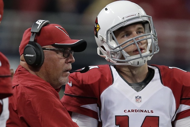 Arizona Cardinals head coach Bruce Arians talks with quarterback Ryan Lindley (14) during the second half of an NFL football game against the St. Louis Rams Thursday, Dec. 11, 2014 in St. Louis. Arizona won 12-6 (AP Photo/Darron Cummings)