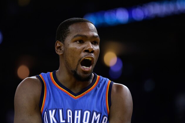 OAKLAND, CA - DECEMBER 18:  Kevin Durant #35 of the Oklahoma City Thunder complains to the officials during their game against the Golden State Warriors at ORACLE Arena on December 18, 2014 in Oakland, California. NOTE TO USER: User expressly acknowledges and agrees that, by downloading and or using this photograph, User is consenting to the terms and conditions of the Getty Images License Agreement.  (Photo by Ezra Shaw/Getty Images)