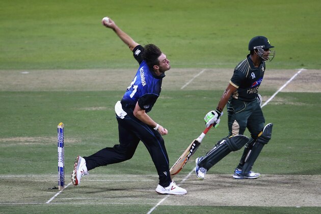 ABU DHABI, UNITED ARAB EMIRATES - DECEMBER 17: Mitchell McClenaghan of New Zealand bowls during the 4th One Day International match between Pakistan and New Zealand at Sheikh Zayed Stadium on December 17, 2014 in Abu Dhabi, United Arab Emirates.  (Photo by Francois Nel/Getty Images)