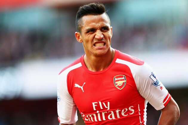 LONDON, ENGLAND - AUGUST 16: Alexis Sanchez of Arsenal grimaces during the Barclays Premier League match between Arsenal and Crystal Palace at Emirates Stadium on August 16, 2014 in London, England.  (Photo by Clive Mason/Getty Images)