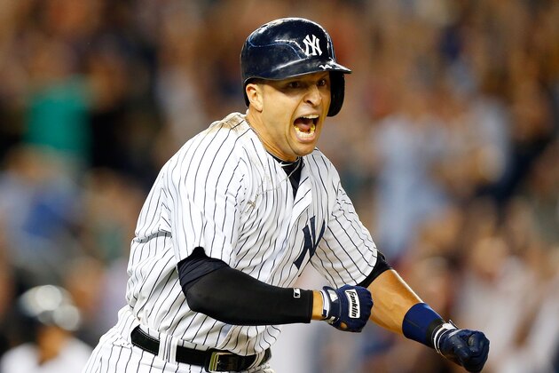 NEW YORK, NY - AUGUST 22:  Martin Prado #14 of the New York Yankees reacts after his game-winning ninth inning base hit against the Chicago White Sox at Yankee Stadium on August 22, 2014 in the Bronx borough of New York City.  (Photo by Jim McIsaac/Getty Images)