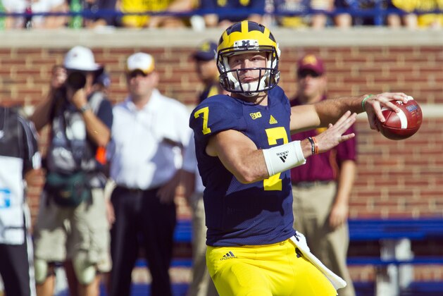 Michigan quarterback Shane Morris (7) throws a pass in the first quarter of an NCAA college football game against Minnesota in Ann Arbor, Mich., Saturday, Sept. 27, 2014. (AP Photo/Tony Ding)