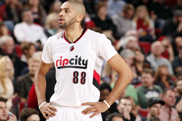PORTLAND, OR - DECEMBER 17: Nicolas Batum #88 of the Portland Trail Blazers stands on the court during a game against the Milwaukee Bucks on December 17, 2014 at the Moda Center Arena in Portland, Oregon. NOTE TO USER: User expressly acknowledges and agrees that, by downloading and or using this photograph, user is consenting to the terms and conditions of the Getty Images License Agreement. Mandatory Copyright Notice: Copyright 2014 NBAE (Photo by Cameron Browne/NBAE via Getty Images)