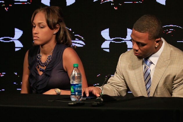OWINGS MILLS, MD - MAY 23:  Running back Ray Rice of the Baltimore Ravens looks over his notes while addressing a news conference with his wife Janay at the Ravens training center on May 23, 2014 in Owings Mills, Maryland. Rice spoke publicly for the first time since facing felony assault charges stemming from a February incident involving Janay at an Atlantic City casino.  (Photo by Rob Carr/Getty Images)