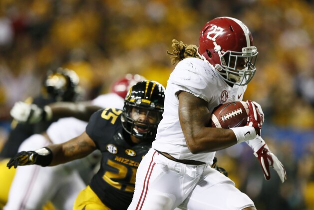 ATLANTA, GA - DECEMBER 06:  Derrick Henry #27 of the Alabama Crimson Tide rushes for a touchdown against the Missouri Tigers in the fourth quarter of the SEC Championship game at the Georgia Dome on December 6, 2014 in Atlanta, Georgia.  (Photo by Kevin C. Cox/Getty Images)