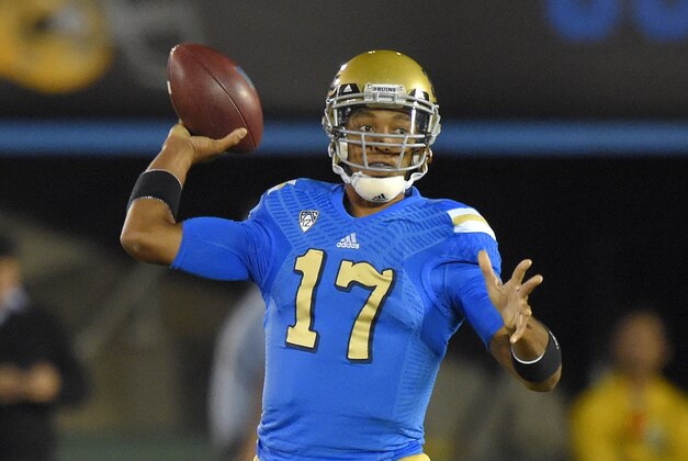 UCLA quarterback Brett Hundley passes during the first half of an NCAA college football game against Southern California, Saturday, Nov. 22, 2014, in Pasadena, Calif. (AP Photo/Mark J. Terrill)