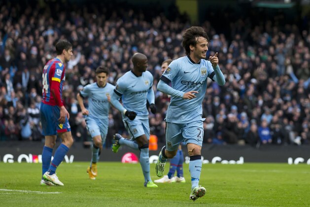 Manchester City's David Silva, right, celebrates after scoring his second goal against Crystal Palace during the English Premier League soccer match between Manchester City and Crystal Palace at the Etihad Stadium, Manchester, England, Saturday Dec. 20, 2014. (AP Photo/Jon Super) Manchester City's David Silva, right, celebrates after scoring his second goal against Crystal Palace during the English Premier League soccer match between Manchester City and Crystal Palace at the Etihad Stadium, Manchester, England, Saturday Dec. 20, 2014. (AP Photo/Jon Super)