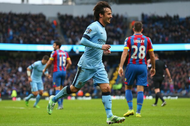MANCHESTER, ENGLAND - DECEMBER 20:  David Silva of Manchester City celebrates scoring his team's second goal during the Barclays Premier League match between Manchester City and Crystal Palace at Etihad Stadium on December 20, 2014 in Manchester, England.  (Photo by Alex Livesey/Getty Images)
