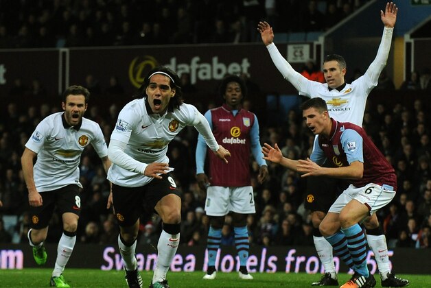 Manchester United's Radamel Falcao, centre left,  celebrates after scoring against Aston Villa during the English Premier League soccer match between Aston Villa and Manchester United at Villa Park, in  Birmingham, England, Saturday, Dec. 20, 2014.  (AP Photo/Rui Vieira)