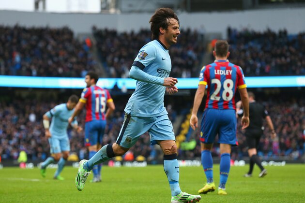 MANCHESTER, ENGLAND - DECEMBER 20:  David Silva of Manchester City celebrates scoring his team's second goal during the Barclays Premier League match between Manchester City and Crystal Palace at Etihad Stadium on December 20, 2014 in Manchester, England.  (Photo by Alex Livesey/Getty Images)