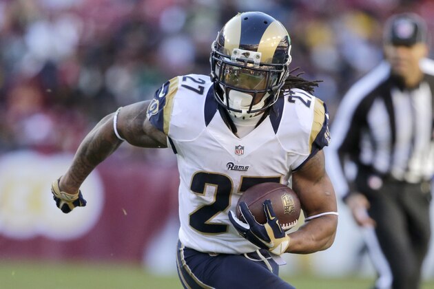 St. Louis Rams running back Tre Mason (27) carries the ball during the first half of an NFL football game against the Washington Redskins in Landover, Md., Sunday, Dec. 7, 2014. (AP Photo/Mark Tenally)