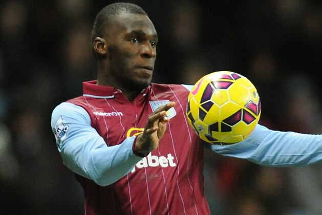 Aston Villa's Christian Benteke controls the ball during the English Premier League soccer match between Aston Villa and Manchester United at Villa Park, in  Birmingham, England, Saturday, Dec. 20, 2014.  (AP Photo/Rui Vieira)