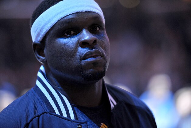 Memphis Grizzlies forward Zach Randolph stands on the court during the singing of the National Anthem before an NBA basketball game Friday, Dec. 12, 2014, in Memphis, Tenn. (AP Photo/Brandon Dill)