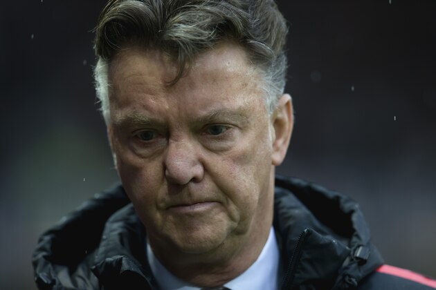 Manchester United manager Louis van Gaal takes to the touchline before the team's English Premier League soccer match between Manchester United and Liverpool at Old Trafford Stadium, Manchester, England, Sunday Dec. 14, 2014. (AP Photo/Jon Super)