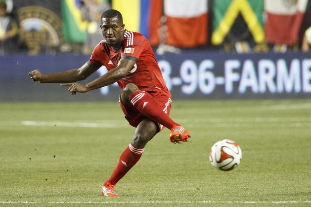 Toronto FC's Doneil Henry in action during the second half of an MLS soccer match against the Philadelphia Union, Wednesday, Sept. 3, 2014, in Chester, PA. The Union won 1-0. (AP Photo/Chris Szagola)