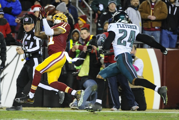 Dec 20, 2014; Landover, MD, USA; Washington Redskins wide receiver DeSean Jackson (11) makes a reception as Philadelphia Eagles cornerback Bradley Fletcher (24) defends during the second half at FedEx Field. The Redskins won 27-24. Mandatory Credit: Brad Mills-USA TODAY Sports