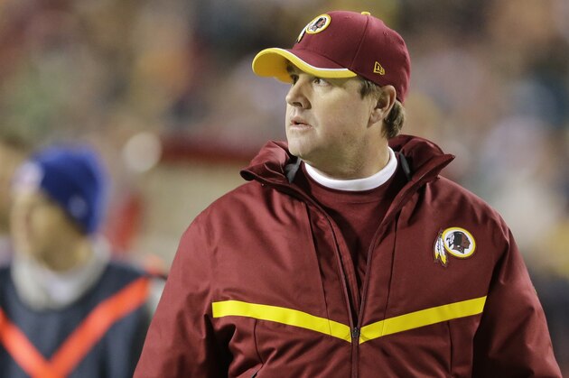 Washington Redskins head coach Jay Gruden watchers the action from the sideliens during the first half of an NFL football game against the Philadelphia Eagles in Landover, Md., Saturday, Dec. 20, 2014. (AP Photo/Patrick Semansky)