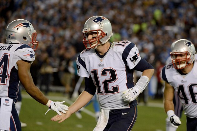 SAN DIEGO, CA-  DECEMBER 7:  Tom Brady #12 of the New England Patriots celebrates his fourth-quarter touchdown pass to Julian Edelman (not pictured) during an NFL game at Qualcomm Stadium on December 7, 2014 in San Diego, California. (Photo by Donald Miralle/Getty Images)