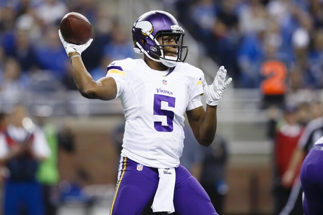 Minnesota Vikings quarterback Teddy Bridgewater (5) passes against the Detroit Lions during an NFL football game at Ford Field in Detroit, Sunday, Dec. 14, 2014. (AP Photo/Rick Osentoski)
