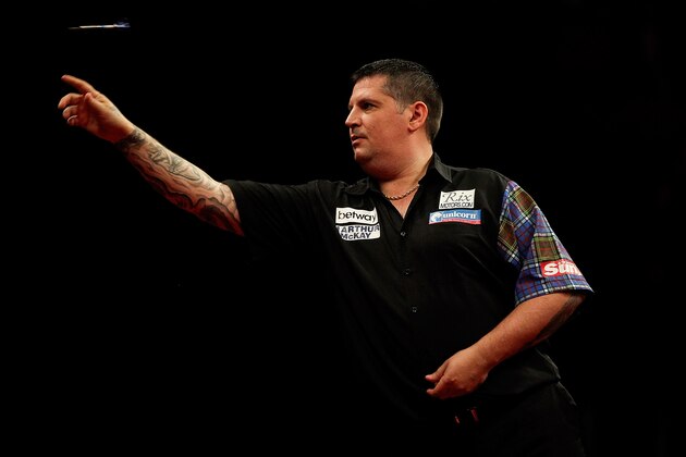 LONDON, ENGLAND - MAY 22: Gary Anderson of Scotland in action during the McCoys Premier League Darts Play-Offs Semi Final match between Michael van Gerwen and Gary Anderson at O2 Arena on May 22, 2014 in London, England.  (Photo by Ben Hoskins/Getty Images)