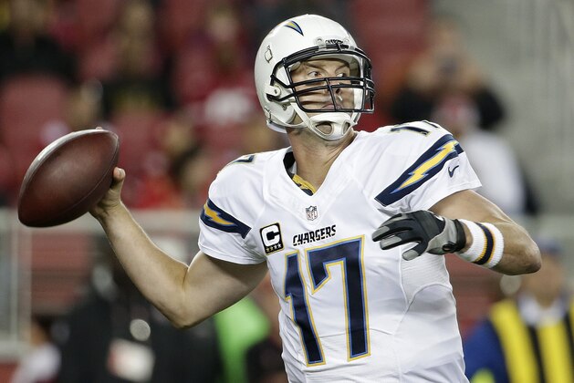 San Diego Chargers quarterback Philip Rivers (17) passes against the San Francisco 49ers during the first quarter of an NFL football game in Santa Clara, Calif., Saturday, Dec. 20, 2014. (AP Photo/Marcio Jose Sanchez)