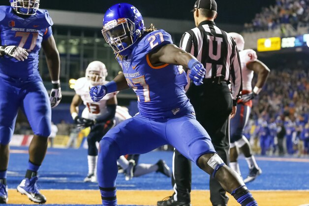 Boise State running back Jay Ajayi (27) celebrates after his touchdown during the first half of the Mountain West Conference championship NCAA college football game against Fresno State in Boise, Idaho, on Saturday, Dec. 6, 2014. (AP Photo/Otto Kitsinger)