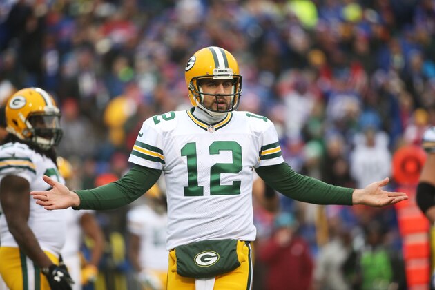 ORCHARD PARK, NY - DECEMBER 14:  Aaron Rodgers #12 of the Green Bay Packers looks for a call from the referee against the Buffalo Bills during the first half at Ralph Wilson Stadium on December 14, 2014 in Orchard Park, New York.  (Photo by Tom Szczerbowski/Getty Images)