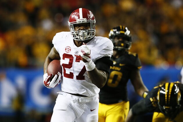ATLANTA, GA - DECEMBER 06:  Derrick Henry #27 of the Alabama Crimson Tide rushes against the Missouri Tigers in the fourth quarter of the SEC Championship game at the Georgia Dome on December 6, 2014 in Atlanta, Georgia.  (Photo by Kevin C. Cox/Getty Images)