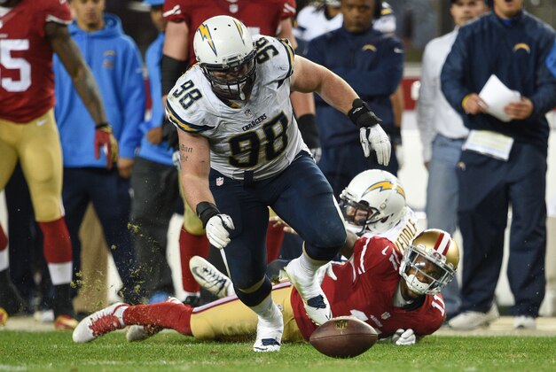 December 20, 2014; Santa Clara, CA, USA; San Diego Chargers nose tackle Sean Lissemore (98) recovers a fumble by San Francisco 49ers wide receiver Quinton Patton (11) during overtime at Levi's Stadium. The Chargers defeated the 49ers 38-35. Mandatory Credit: Kyle Terada-USA TODAY Sports
