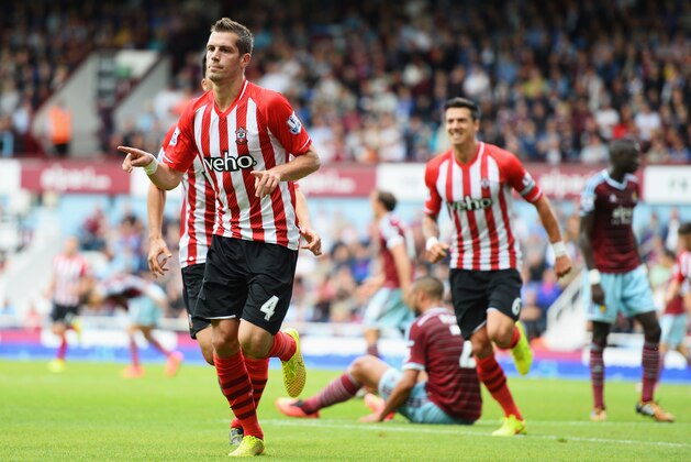 LONDON, ENGLAND - AUGUST 30:  Morgan Schneiderlin of Southampton celebrates scoring the equalising goal during the Barclays Premier League match between West Ham United and Southampton at Boleyn Ground on August 30, 2014 in London, England.  (Photo by Jamie McDonald/Getty Images)