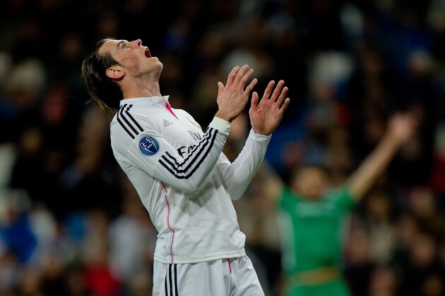 MADRID, SPAIN - DECEMBER 09: Gareth Bale of Real Madrid CF reacts as he fail to score during the UEFA Champions League Group B match between Real Madrid CF and PFC Ludogorets Razgrad at Estadio Santiago Bernabeu on December 9, 2014 in Madrid, Spain.  (Photo by Gonzalo Arroyo Moreno/Getty Images)