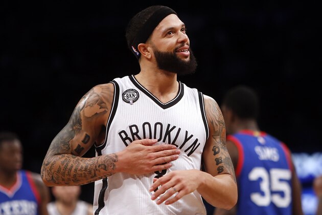Brooklyn Nets' Deron Williams is seen during the first quarter of an NBA basketball game against the Philadelphia 76ers Friday, Dec. 12, 2014, in New York.  Brooklyn beat Philadelphia 88-70. (AP Photo/Jason DeCrow)