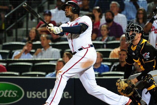 ATLANTA, GA - SEPTEMBER 24: Justin Upton #8 of the Atlanta Braves hits a fourth inning two-run home run against the Pittsburgh Pirates at Turner Field on September 24, 2014 in Atlanta, Georgia. (Photo by Scott Cunningham/Getty Images)