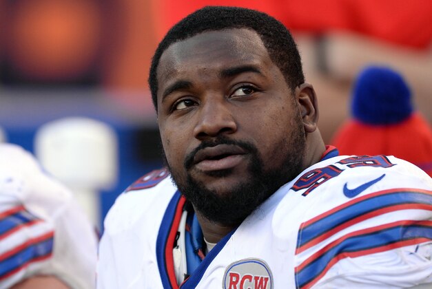 Dec 7, 2014; Denver, CO, USA; Buffalo Bills defensive tackle Marcell Dareus (99) on the bench in the third quarter against the Denver Broncos at Sports Authority Field at Mile High. The Broncos defeated the Bills 24-17. Mandatory Credit: Ron Chenoy-USA TODAY Sports