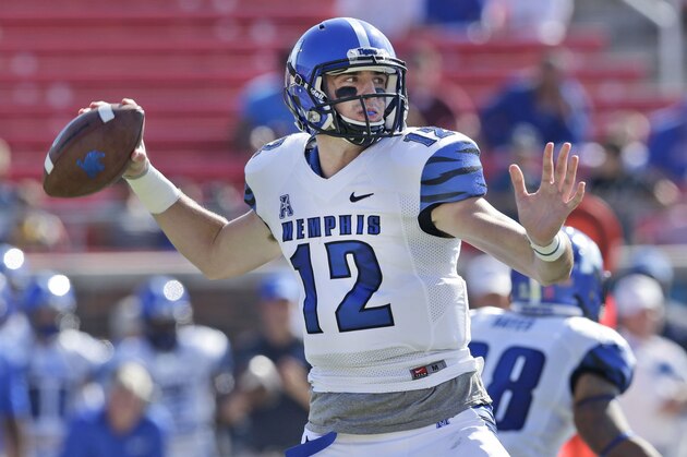 Memphis quarterback Paxton Lynch (12) passes during the the first half of an NCAA college football game against SMU, Saturday, Oct. 25, 2014, in Dallas. (AP Photo/LM Otero)