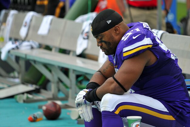 Dec 21, 2014; Miami Gardens, FL, USA; Minnesota Vikings defensive end Everson Griffen (97) sits on the bench during the second half against the Miami Dolphins at Sun Life Stadium. The Dolphins won 37-35. Mandatory Credit: Steve Mitchell-USA TODAY Sports