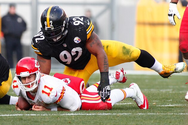 PITTSBURGH, PA - DECEMBER 21:  Alex Smith #11 of the Kansas City Chiefs is tackled by James Harrison #92 of the Pittsburgh Steelers during the third quarter at Heinz Field on December 21, 2014 in Pittsburgh, Pennsylvania.  (Photo by Justin K. Aller/Getty Images)