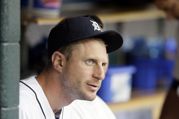 Detroit Tigers starting pitcher Max Scherzer is seen in the dugout during the first inning of a baseball game against the Cleveland Indians in Detroit, Friday, July 18, 2014. (AP Photo/Carlos Osorio)