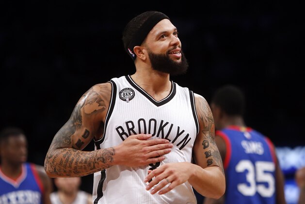 Brooklyn Nets' Deron Williams is seen during the first quarter of an NBA basketball game against the Philadelphia 76ers Friday, Dec. 12, 2014, in New York.  Brooklyn beat Philadelphia 88-70. (AP Photo/Jason DeCrow)