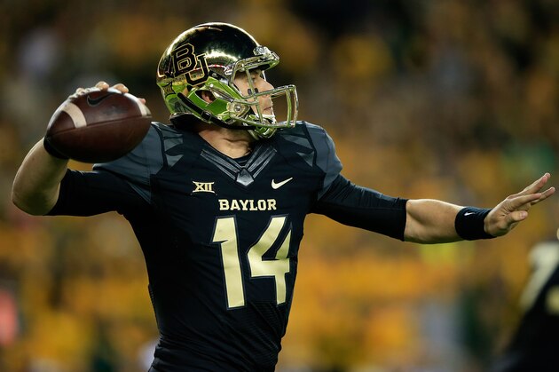 WACO, TX - DECEMBER 06:  Bryce Petty #14 of the Baylor Bears passes against the Kansas State Wildcats during the first half of the game on December 6, 2014  at McLane Stadium in Waco, Texas.  (Photo by Jamie Squire/Getty Images)
