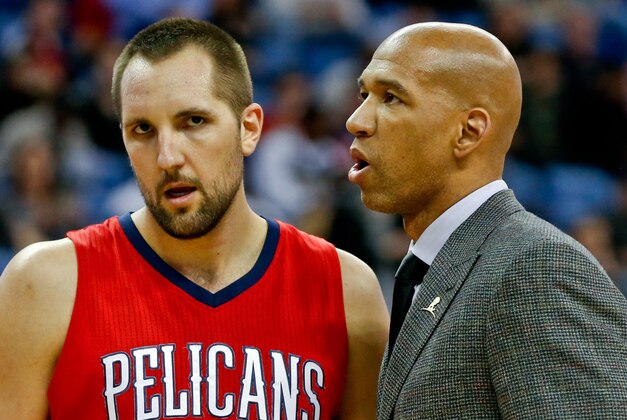 Dec 16, 2014; New Orleans, LA, USA; New Orleans Pelicans head coach Monty Williams talks with forward Ryan Anderson (33) during the second half of a game against the Utah Jazz at the Smoothie King Center. The Pelicans defeated the Jazz 119-111. Mandatory Credit: Derick E. Hingle-USA TODAY Sports