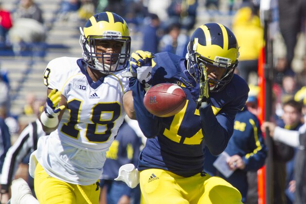 Michigan defensive back Blake Countess (18) breaks up a pass intended for wide receiver Freddy Canteen (17), during the football team's annual spring game, Saturday, April 5, 2014, in Ann Arbor, Mich. (AP Photo/Tony Ding)