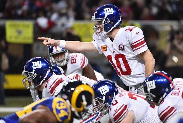 Dec 21, 2014; St. Louis, MO, USA; New York Giants quarterback Eli Manning (10) calls a play at the line against the St. Louis Rams during the second half at the Edward Jones Dome. The New York Giants defeat the St. Louis Rams 37-27. Mandatory Credit: Jasen Vinlove-USA TODAY Sports