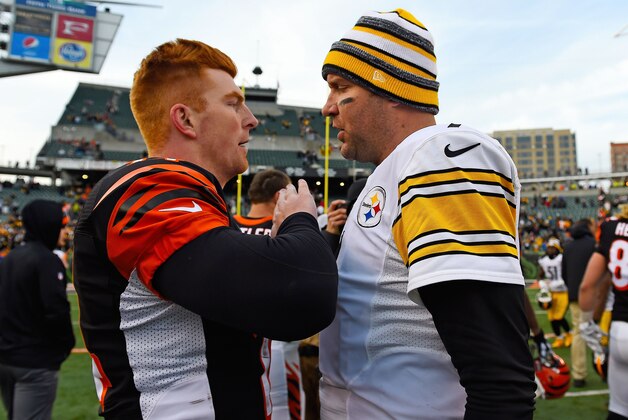 Dec 7, 2014; Cincinnati, OH, USA; Pittsburgh Steelers quarterback Ben Roethlisberger (7) and Cincinnati Bengals quarterback Andy Dalton (14) after the game at Paul Brown Stadium. Pittsburgh Steelers defeat the Cincinnati Bengals 42-21. Mandatory Credit: Mike DiNovo-USA TODAY Sports