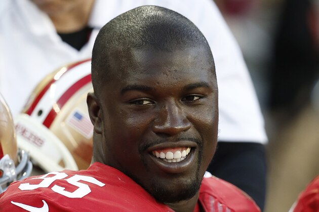 San Francisco 49ers defensive end Tank Carradine (95) sits on the bench during the second half of an NFL football game against the Washington Redskins in Santa Clara, Calif., Sunday, Nov. 23, 2014. (AP Photo/Tony Avelar)