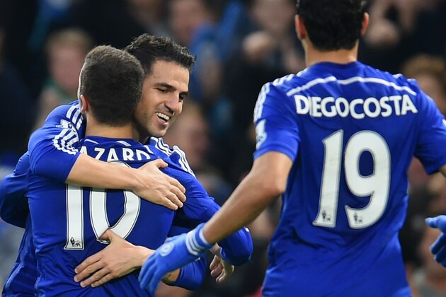 LONDON, ENGLAND - NOVEMBER 22:  Cesc Fabregas of Chelsea hugs Eden Hazard of Chelsea after he scored their second goal during the Barclays Premier League match between Chelsea and West Bromwich Albion at Stamford Bridge on November 22, 2014 in London, England.  (Photo by Tom Dulat/Getty Images)