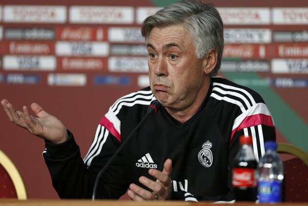MARRAKECH, MOROCCO - DECEMBER 19: Carlo Ancelotti, manager of Real Madrid talks to the media during a FIFA press conference at the Sofitel Marrekch on December 19, 2014 in Marrakech, Morocco.  (Photo by Steve Bardens/Getty Images)