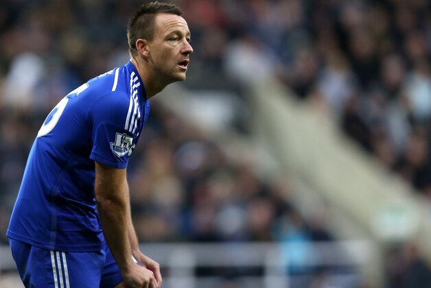 Chelsea's captain John Terry during their English Premier League soccer match against Newcastle United at St James' Park, Newcastle, England, Saturday, Dec. 6, 2014. (AP Photo/Scott Heppell)